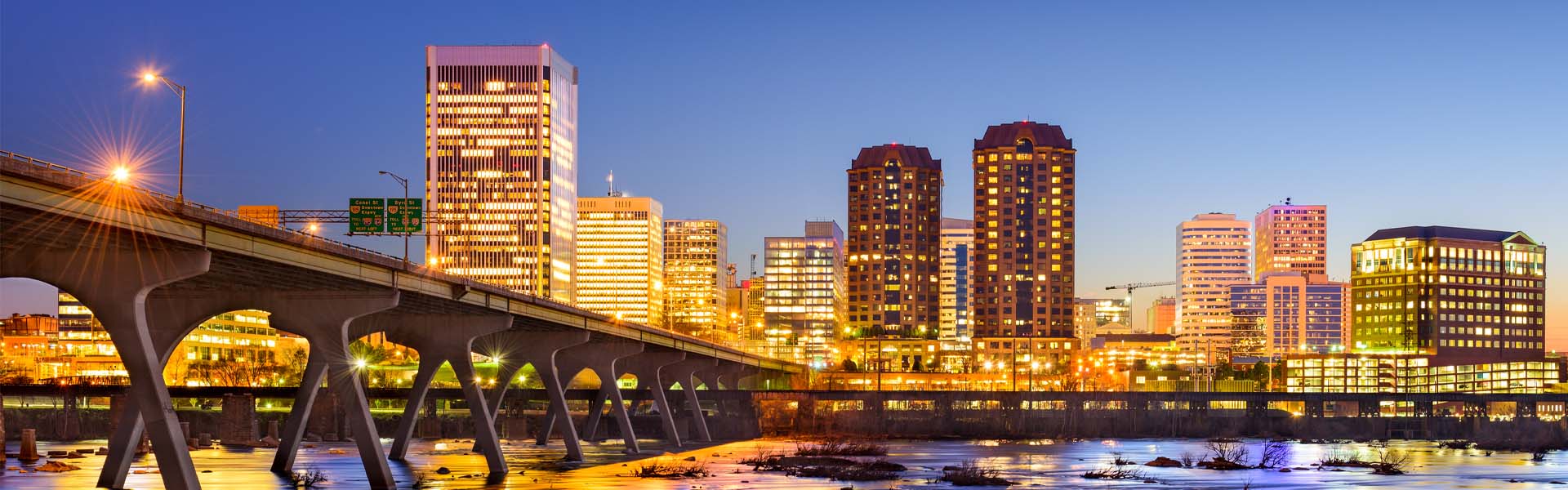 Neon color image of a band playing and people singing along