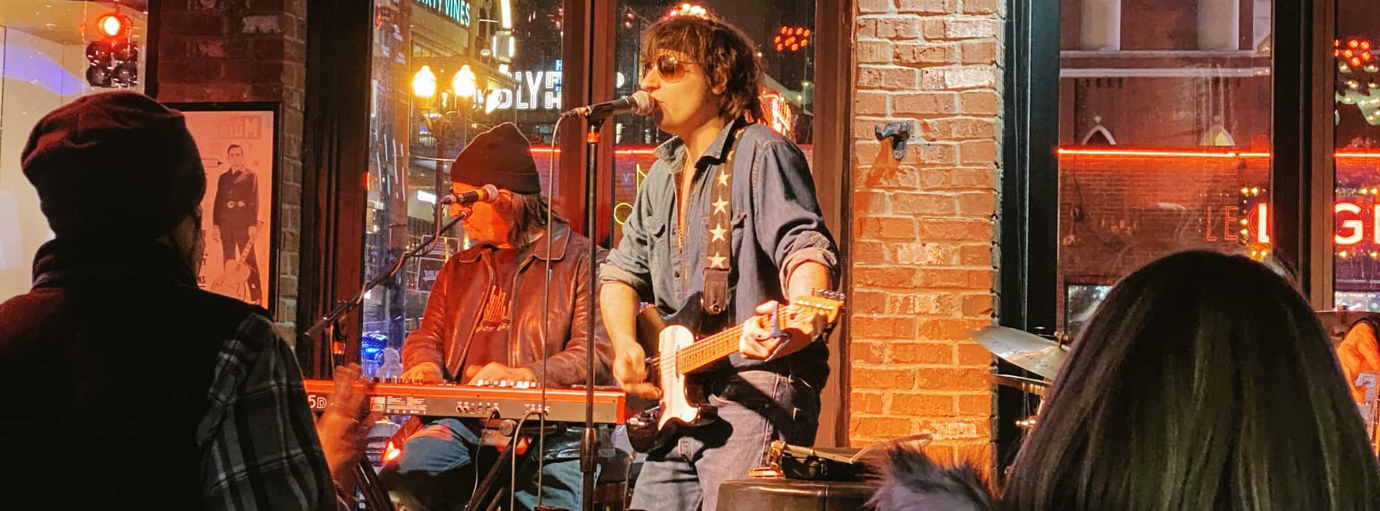 bar singer on guitar in Richmond